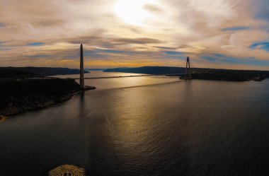 Yavuz Sultan Selim Bridge in Istanbul, Turkey. 3rd bridge of Istanbul Bosphorus with blue sky. clipart