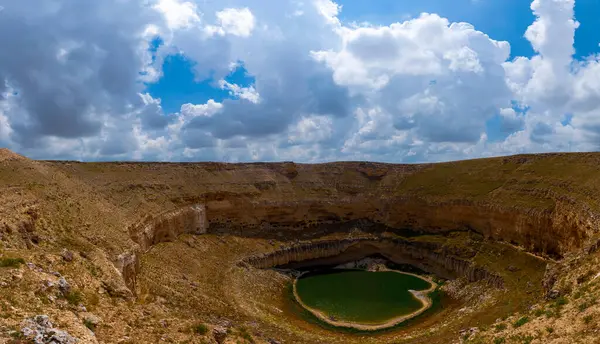 stock image Cirali Sinkhole is located in the Akviran Plateau in the northwest of Yenikent Sub-district of Konya's Karapnar district.