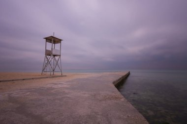 Lifeguard towers taken on different beaches. clipart