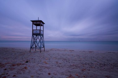 Lifeguard towers taken on different beaches. clipart