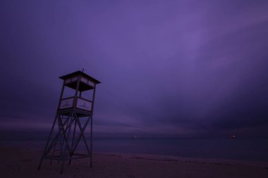 Lifeguard towers taken on different beaches. clipart