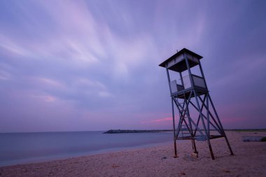 Lifeguard towers taken on different beaches. clipart