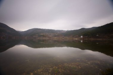 Tarakli historical houses and Cubuklu lake in Bolu Goynuk province clipart