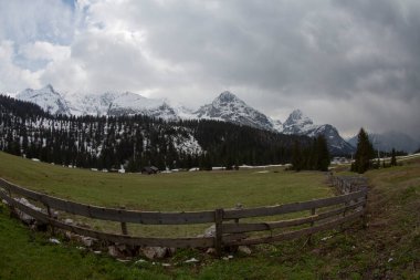 The Appenzell region and especially the Seealpsee and Aescher clipart