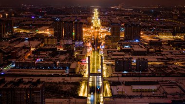 Changchun, Çin 'de şafaktan önce Changchun Köprüsü' nde kış manzarası.