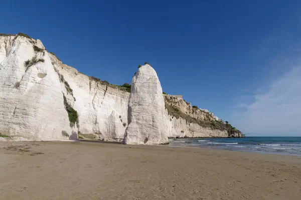 stock image Pizzomunno limestone cliff on the beach of Vieste, Gargano, Foggia Province, Apulia, Italy