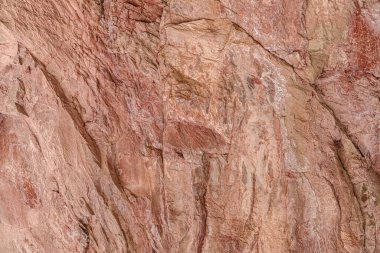 Kırmızı demir oksit kayalarının doğal taş dokusu