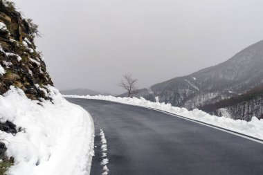 Mountain road in winter, Tanaro valley, Piedmont, Ligurian Alps, Italy