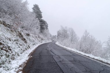 Mountain road in winter, Tanaro valley, Piedmont, Ligurian Alps, Italy