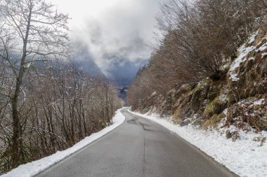 Mountain road in winter, Tanaro valley, Piedmont, Ligurian Alps, Italy