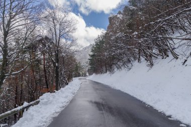 Mountain road in winter, Tanaro valley, Piedmont, Ligurian Alps, Italy