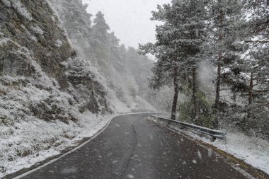 Mountain road in winter, Tanaro valley, Piedmont, Ligurian Alps, Italy