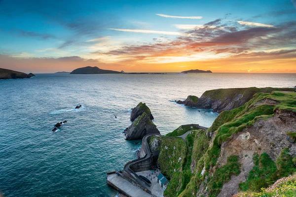 stock image Sunset over Dunquin Pier at Slea Head on the Atlantic coastline in County Kerry in Ireland
