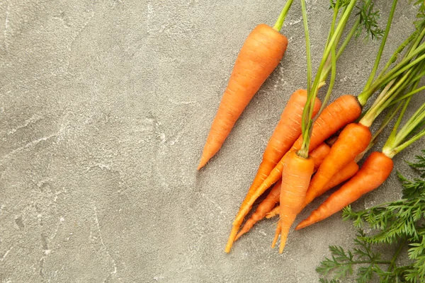 Bunch Baby Carrots Grey Concrete Background Space Text Top View — Stock Photo, Image