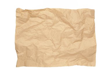 Buruşmuş bej parşömen parçası ya da beyaz arka planda izole edilmiş fırın kağıdı. Metin ve tasarım ögesi için alanı kopyala. Üst görünüm