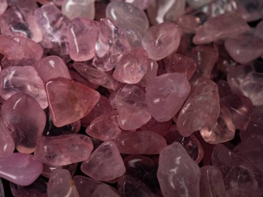Macro shoot of tumbled rose quartz crystal,