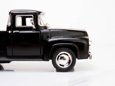 Side view of a black truck miniature toys
