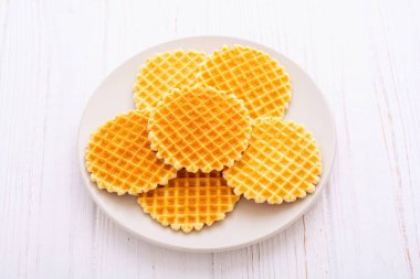 Lezzetli bir kahvaltı. Tatlı altın Belçika waffle 'ları. Gıda arkaplanı