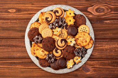 Kurabiye karışımı. Bir sürü sağlıksız atıştırmalık. Üst Manzara. Gıda arkaplanı