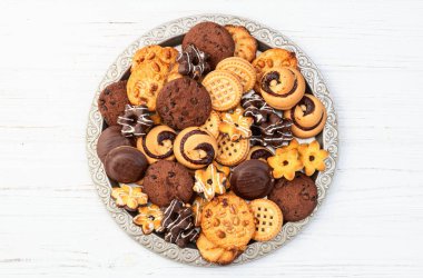 Kurabiye karışımı. Bir sürü sağlıksız atıştırmalık. Üst Manzara. Gıda arkaplanı