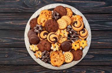 Kurabiye karışımı. Bir sürü sağlıksız atıştırmalık. Üst Manzara. Gıda arkaplanı