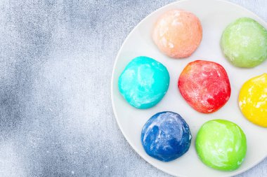 Mix of colorful mochi . Traditional japanese dessert top view clipart