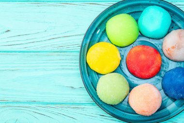 Mix of colorful mochi . Traditional japanese dessert top view clipart