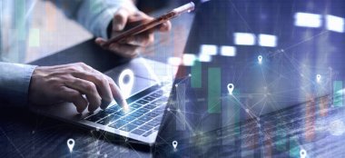 Businessman use internet network on computer searching location target in by GPS Navigator Map , pin address location on computer laptop , GPS map, direction, travel, 5G concept.