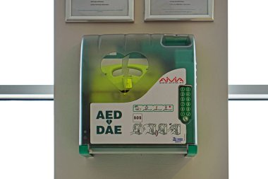 Belgrade, Serbia - May 01, 2015: Aed Dae defibrillator medical device Sos in the box at wall Nikola Tesla, Surcin.