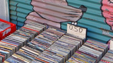 Athens, Greece - May 03, 2015: Second hand music cd and dvd disc for sale at flea market.