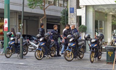 Athens, Greece - May 04, 2015: Motorcycle police force unit at Ermou street in capital city centre.