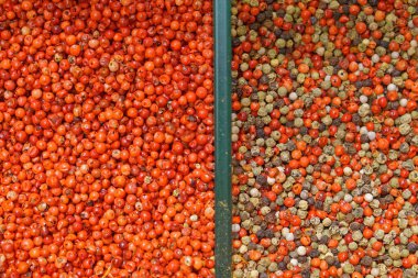 Red peppercorns mixed pepper spices in bulk market