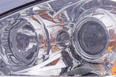 Focus lens beam headlights with plastic housing at modern car