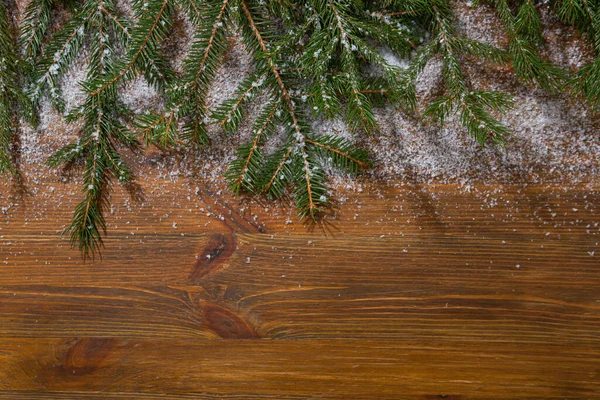 Деревянный Рождественский Фон Зеленым Еловым Снегом — стоковое фото