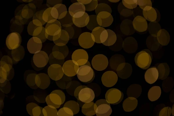 Luce Natale Sfocato Sfondo Nero Giallo — Foto Stock