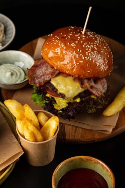 Delicious cheese burger with bacon fast food