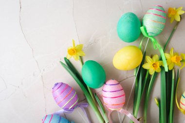 Easter color eggs decor and flowers copy space