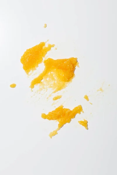 Fondo Bianco Con Scrub Swatch Cosmetici Arancioni — Foto Stock