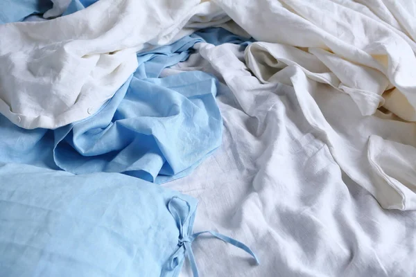 bed linen clothes fabric texture white and blue background