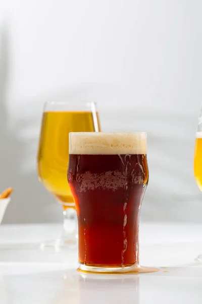 Two Glasses Light Dark Beer Foam — Stock Photo, Image