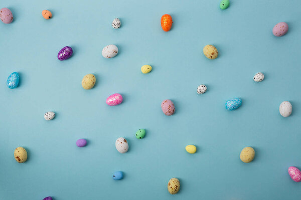 Small chocolate Easter eggs  holiday background 