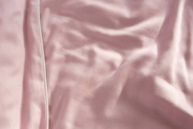 açık pembe saten yatak keten kumaş arka plan ipeği