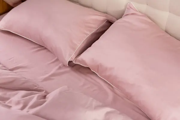 Pale Pink Satin Bed Linen Pillows — Stock Photo, Image