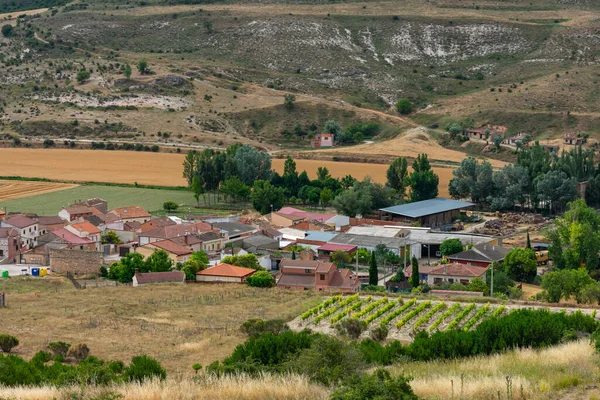 stock image a traditional village on the Castilian plateau in Spain with Romanesque Catholic church