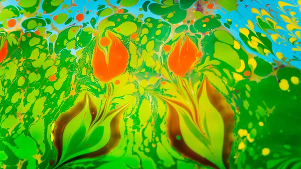 stock image Marbling, multi-colored swirled, stone-like patterns. Paint floating, spreading on the surface of a liquid. Abstract fluid art, ink in motion. Magical marble texture. Ink bloom, blast, paint explosion