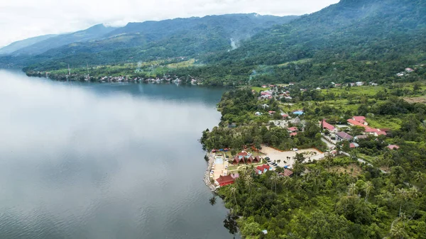 Aerial view of Danau Singkarak. Singkarak lake is one of the beautiful lake located in West Sumatera attracting thousands of tourists. Sumatra, Indonesia, January 25, 2023