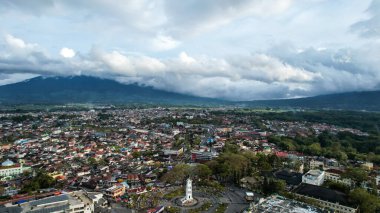Aerial view of Jam Gadang, a historical and most famous landmark in BukitTinggi City, an icon of the city and the most visited tourist destination by tourists. Bukittinggi, Indonesia, January 25, 2023