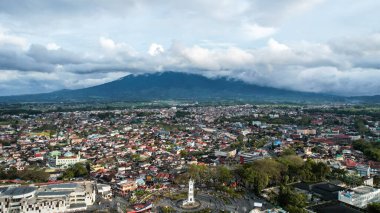 Aerial view of Jam Gadang, a historical and most famous landmark in BukitTinggi City, an icon of the city and the most visited tourist destination by tourists. Bukittinggi, Indonesia, January 25, 2023