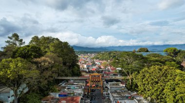 Aerial view of This bridge has a length of 90 metres and width of 3.8 metres connecting the fortress of Fort De Kock and Bukittinggi Zoo. Limpapeh bridge. Bukittinggi, Indonesia, January 25, 2023