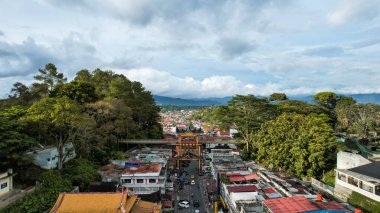 Aerial view of This bridge has a length of 90 metres and width of 3.8 metres connecting the fortress of Fort De Kock and Bukittinggi Zoo. Limpapeh bridge. Bukittinggi, Indonesia, January 25, 2023
